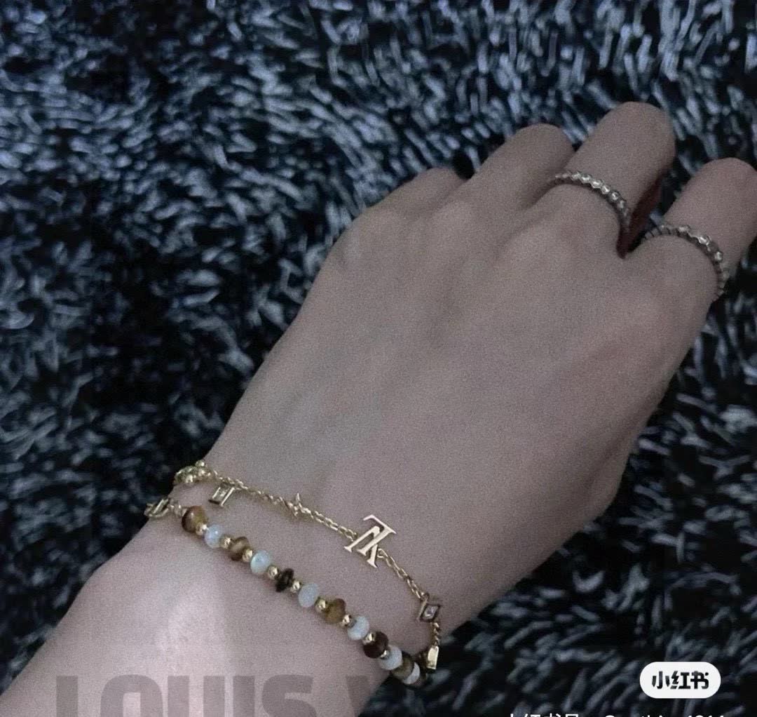 Louis Vuitton Gold Tone Charm Bracelet